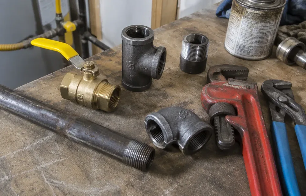 Close-up detail of gas piping parts and tools